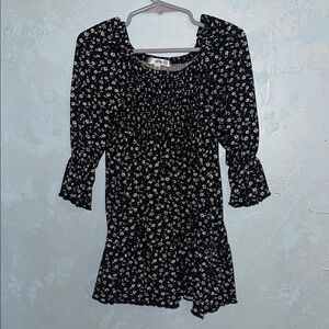 Elegant Black Dress with White Floral Pattern